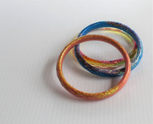 Load image into Gallery viewer, Peachy Sparkles- Sparkly Resin Bangle
